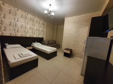 Четырехместный номер в Гостинице Guest House Elif
